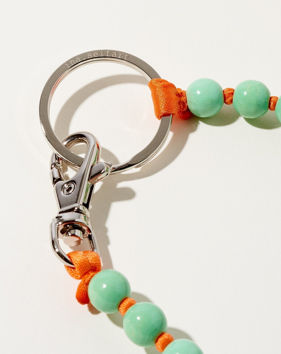 Accessories Ina Seifart | Perlen Long Keyholder In Pastel Green On Orange